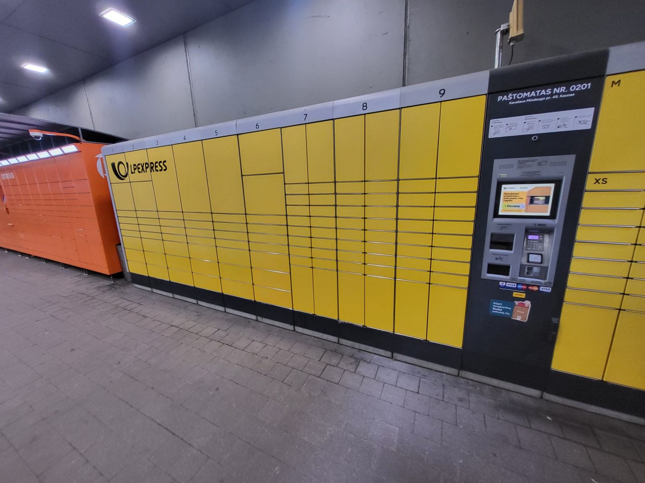 Akropolis package locker with 18 columns.
